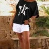 T-Shirt Solene Oversize Noir Star Blanc 1 T-Shirt Solene Oversize Noir Star Blanc -Vêtements Soldes 2024 facetune 23 06 2023 10 47 09