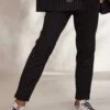 Pantalon Lilian Noir Rayé Blanc -Vêtements Soldes 2024 facetune 24 11 2023 16 07 46